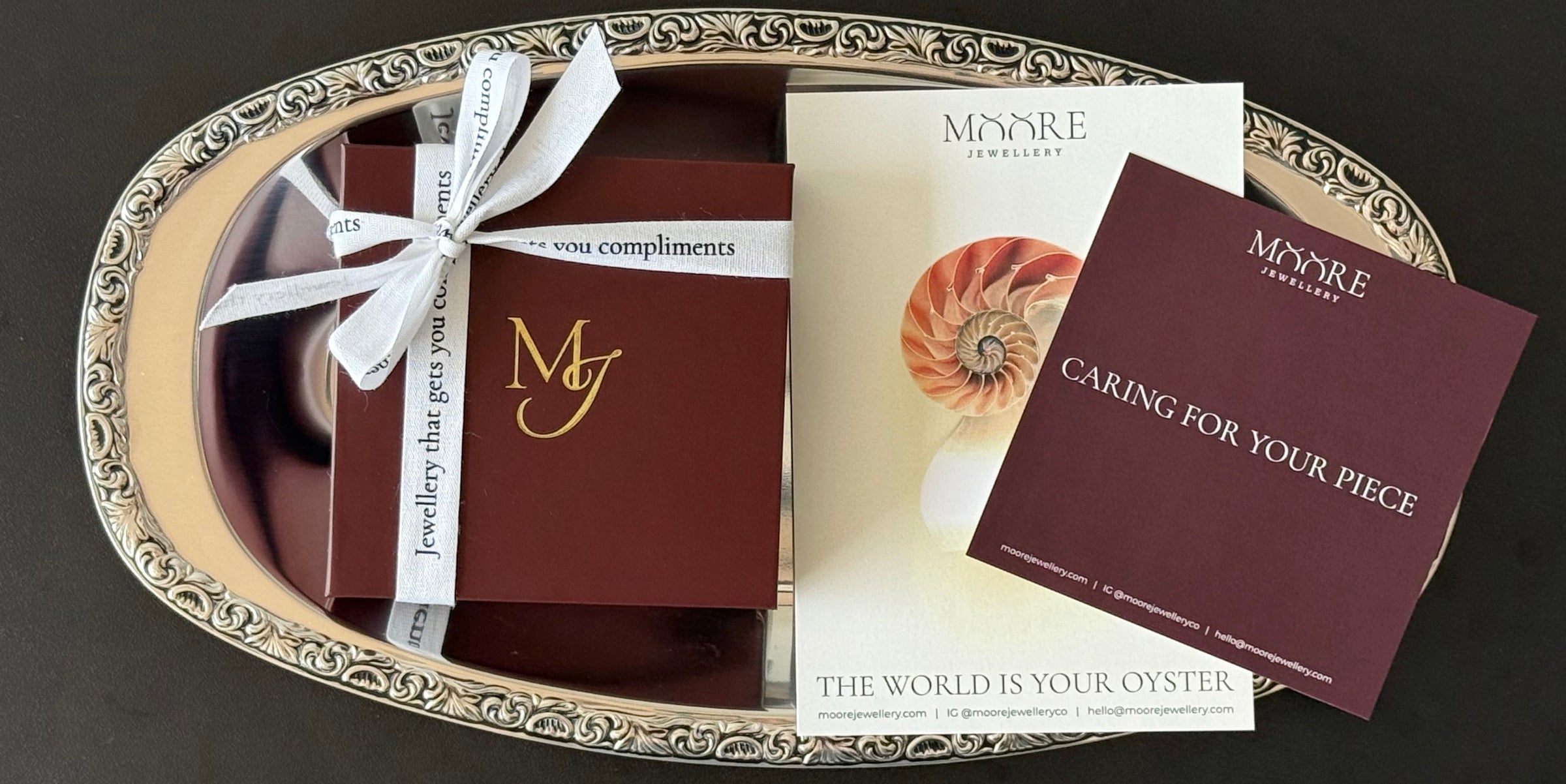 jewellery packaged in a box with ribbon