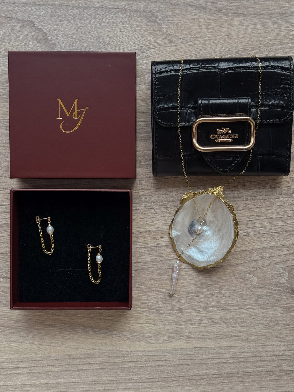 Gold-filled earrings with wrapped freshwater pearl and chain drop