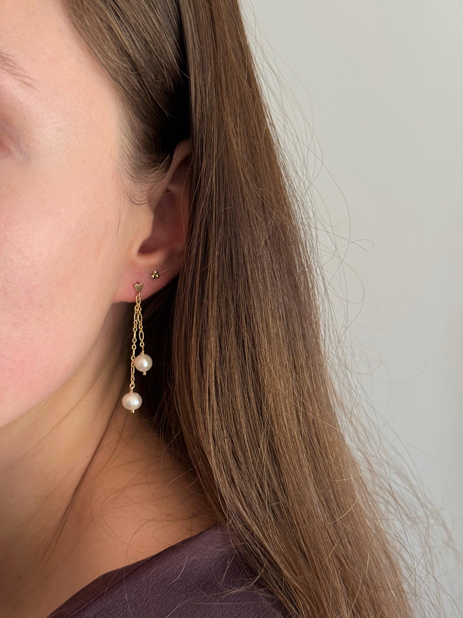 Gold-filled heart stud earrings with long and short pearl drops
