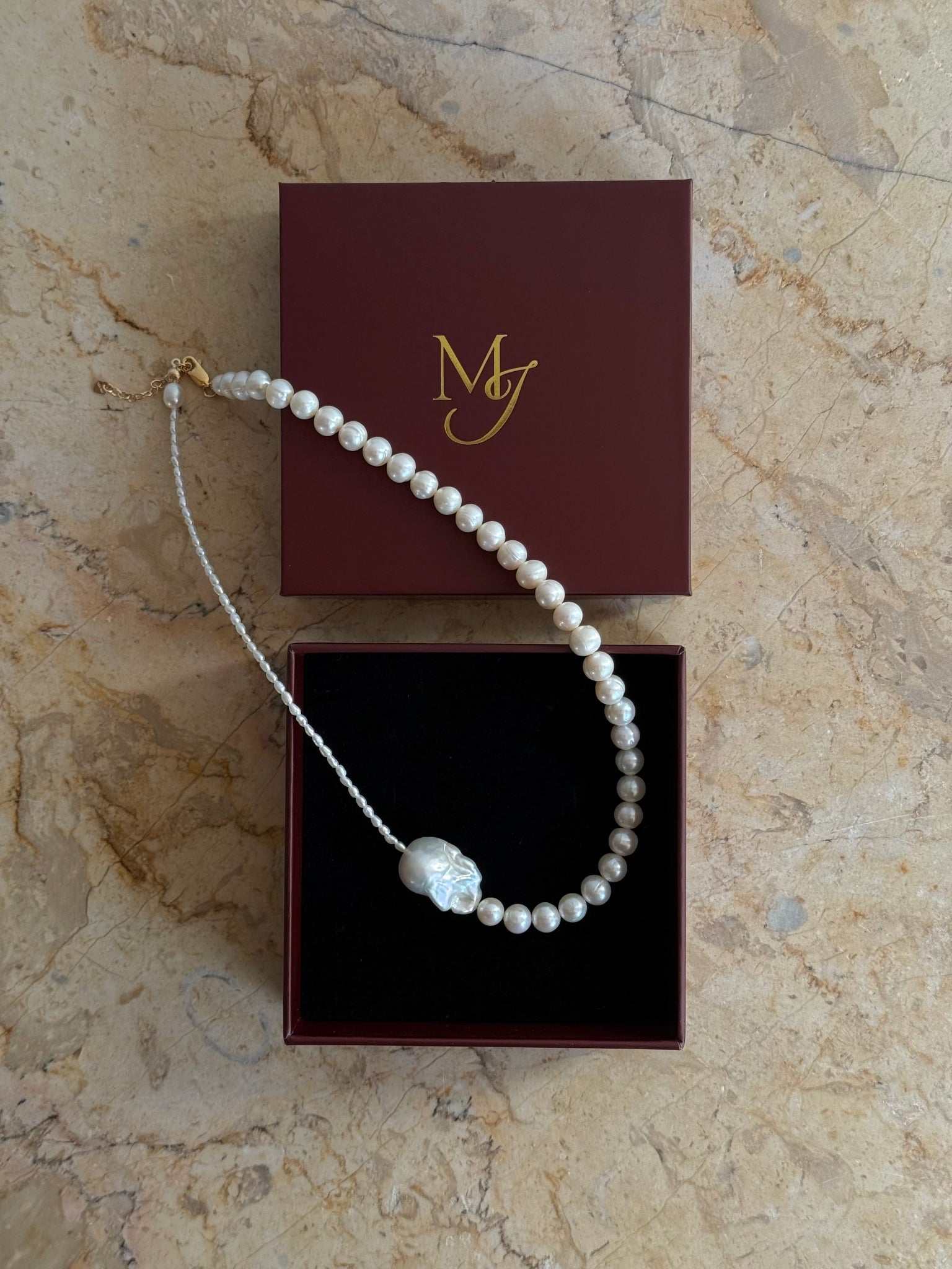 A handcrafted baroque freshwater pearl necklace with deliberate asymmetry. Made to order in Wellington with 14k gold-filled findings. 40cm + extension.