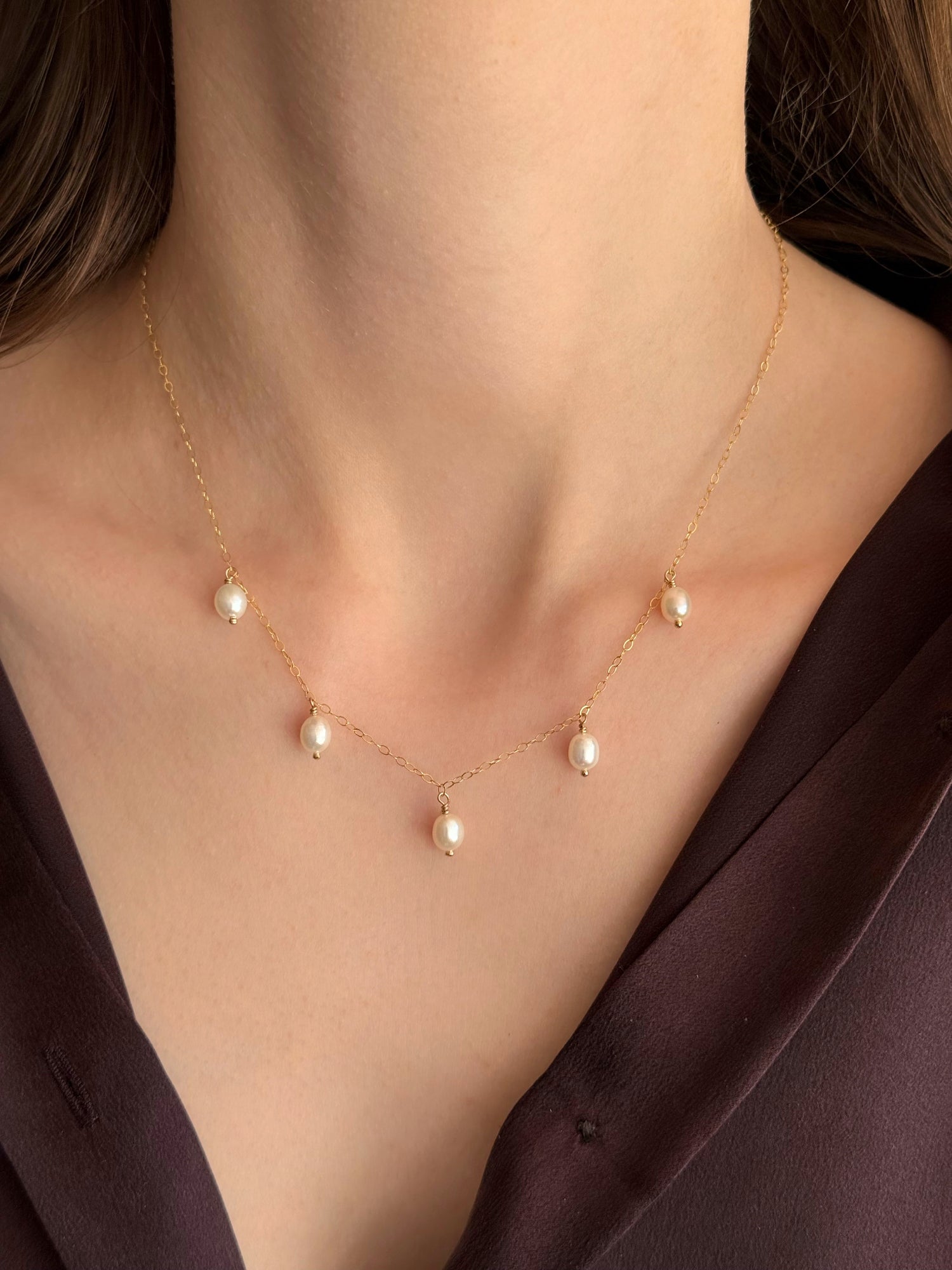Five pearl drop necklace with oval freshwater pearls on gold-filled chain