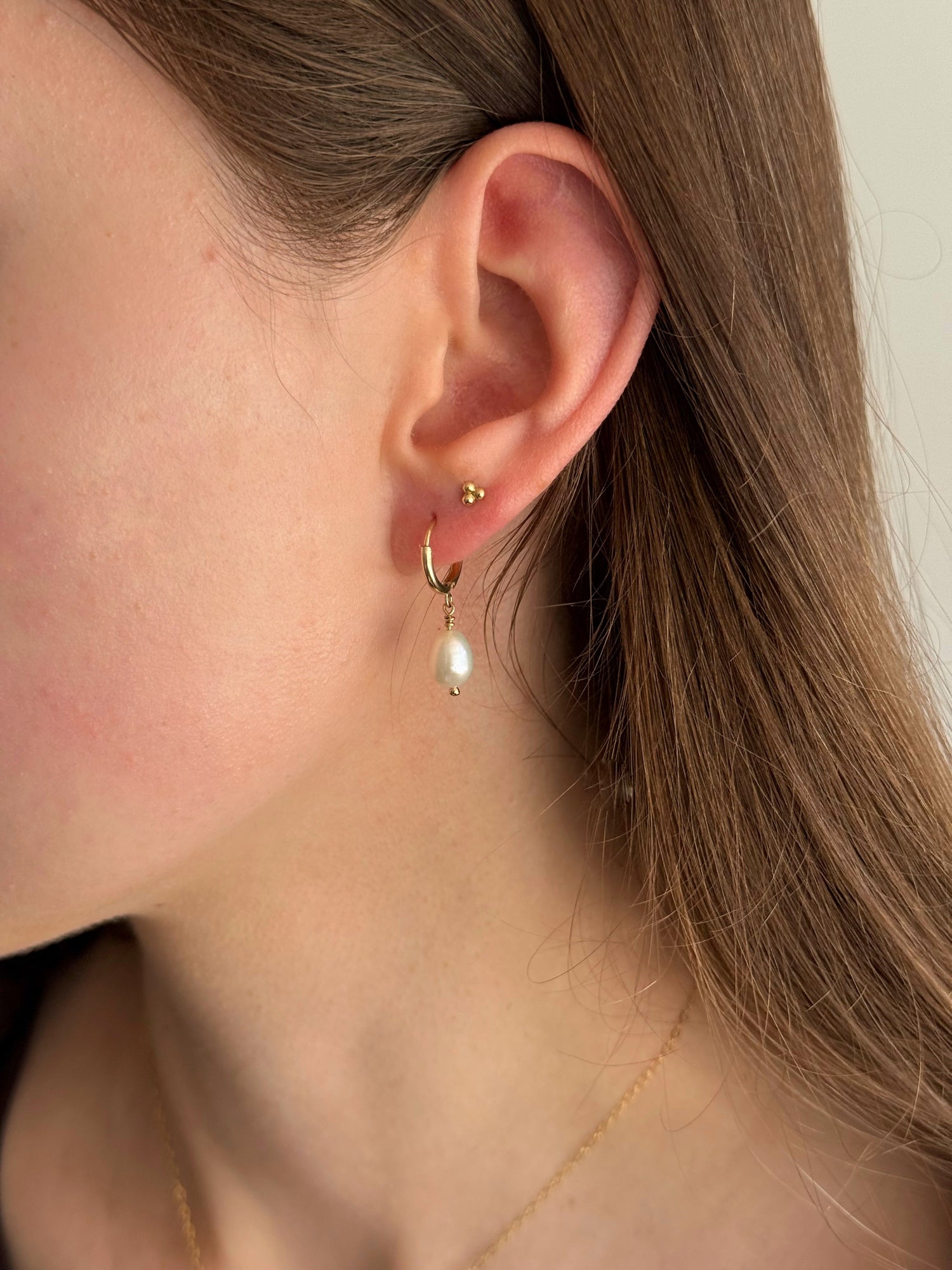 Minimalist gold-filled pearl hoop earrings by Moore Jewellery