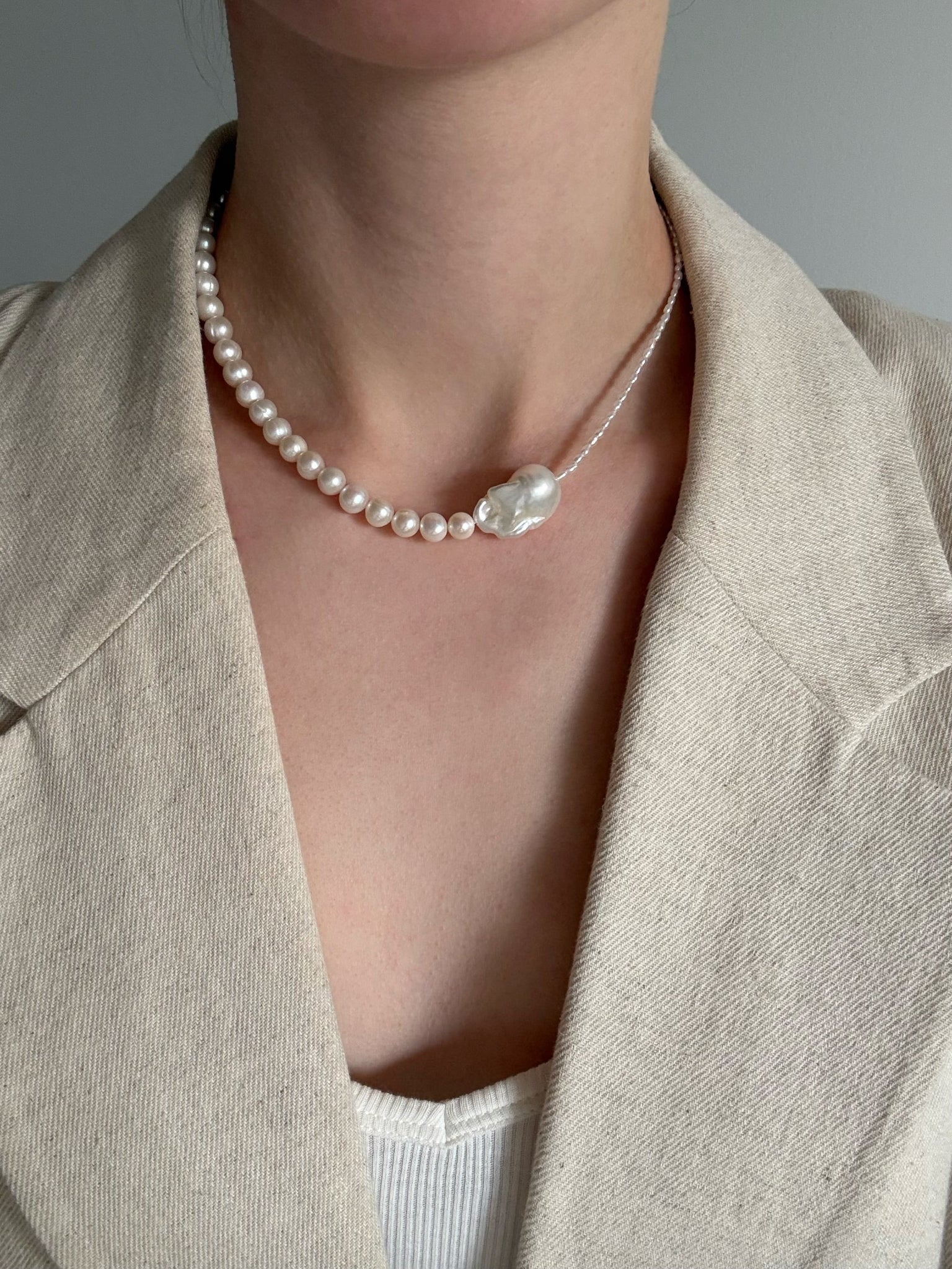 A handcrafted baroque freshwater pearl necklace with deliberate asymmetry. Made to order in Wellington with 14k gold-filled findings. 40cm + extension.