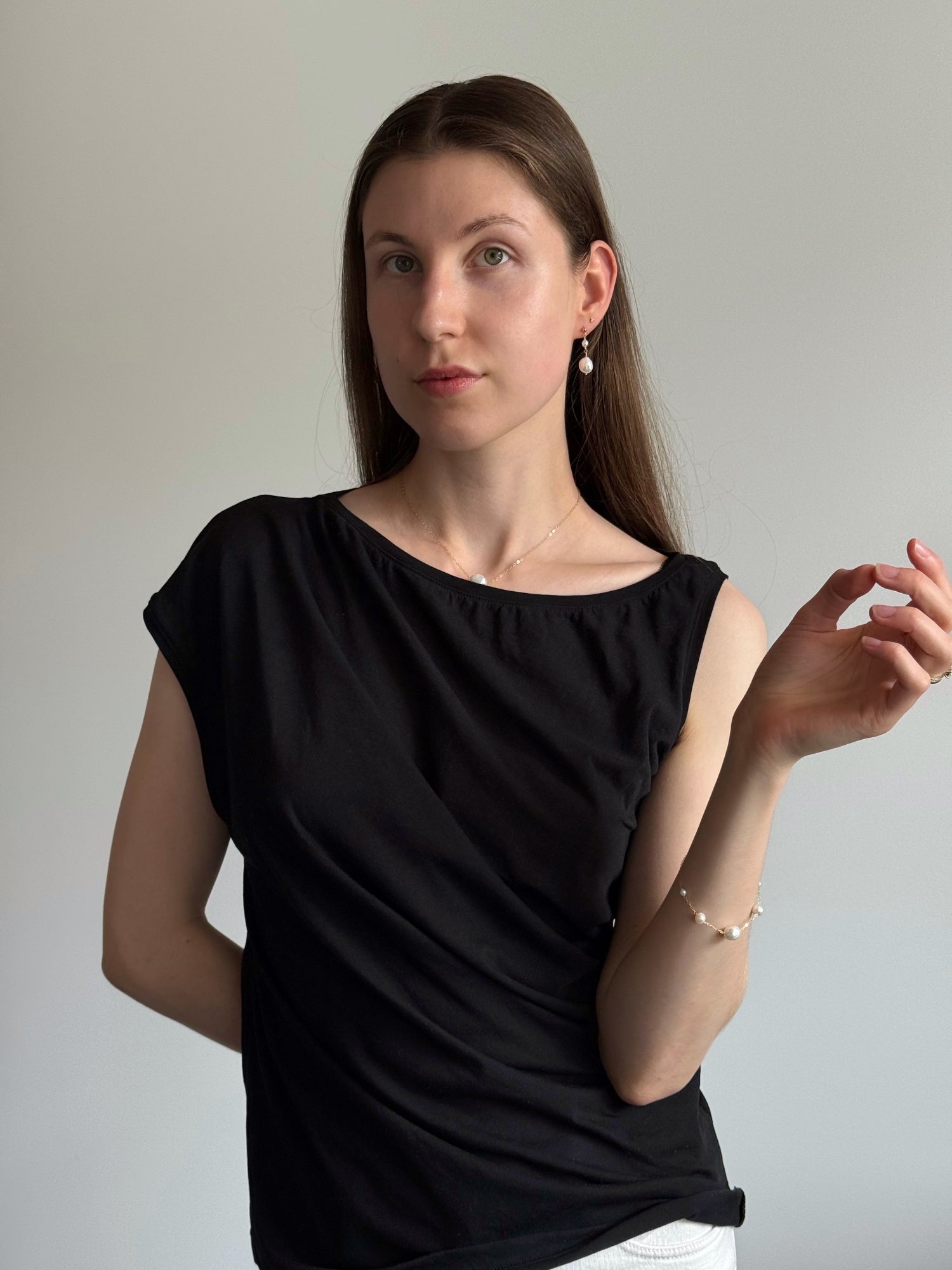 Model wearing Elegant pearl earrings designed for everyday wear