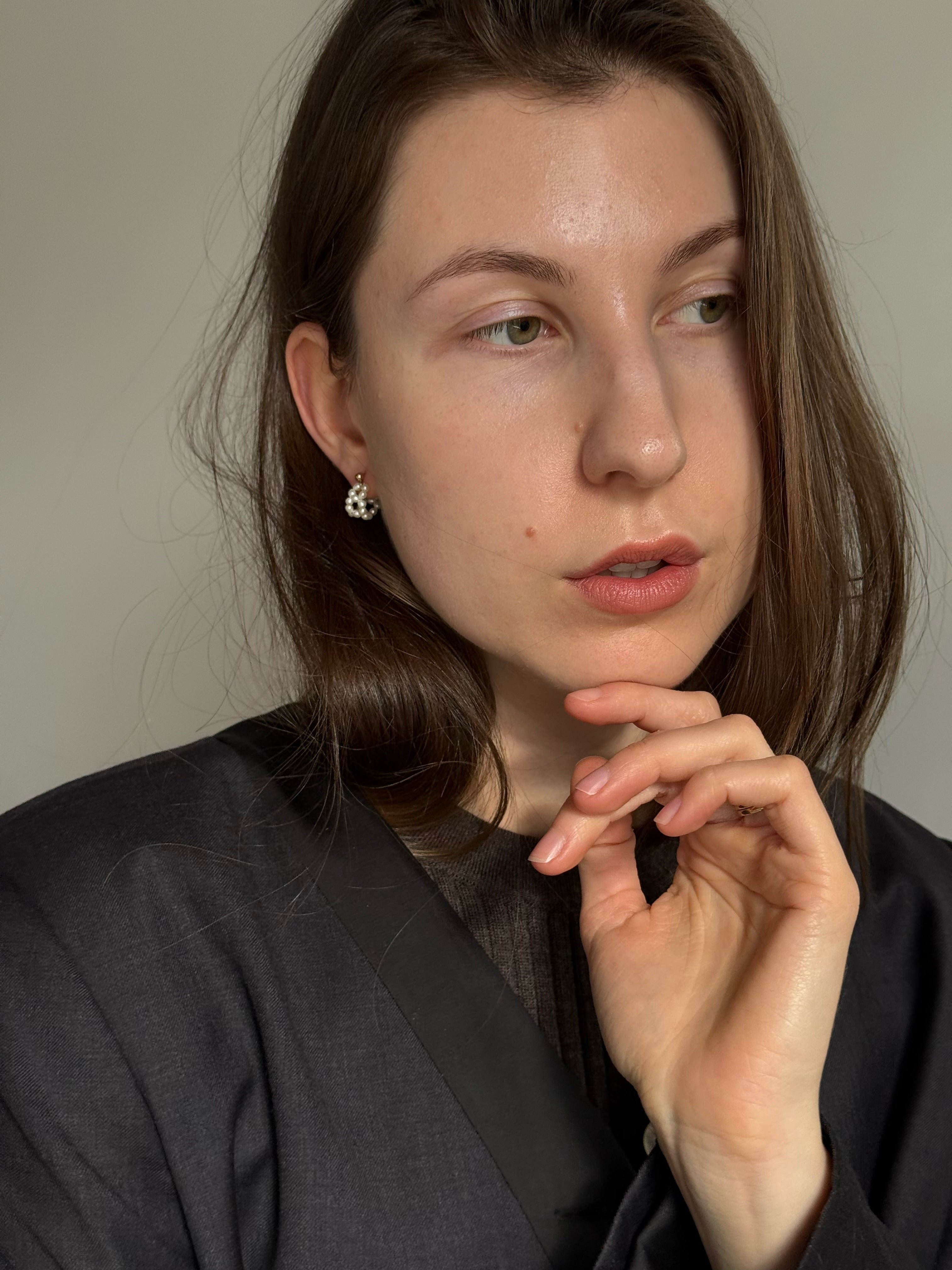 Mini freshwater seed pearl hoop earrings on a 14k gold-filled stud base. 15mm hoop, 2mm pearls. Quietly feminine, worn daily. Made to order in Wellington.