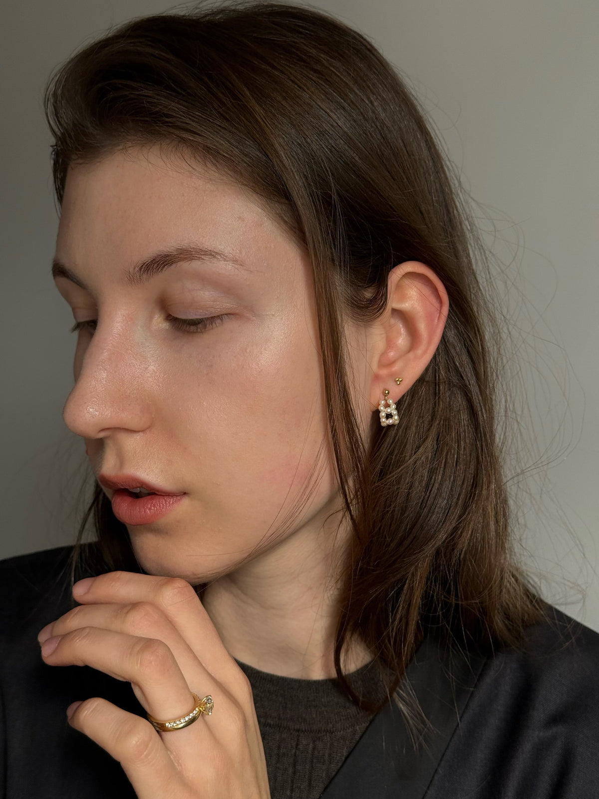 Mini freshwater seed pearl hoop earrings on a 14k gold-filled stud base. 15mm hoop, 2mm pearls. Quietly feminine, worn daily. Made to order in Wellington.
