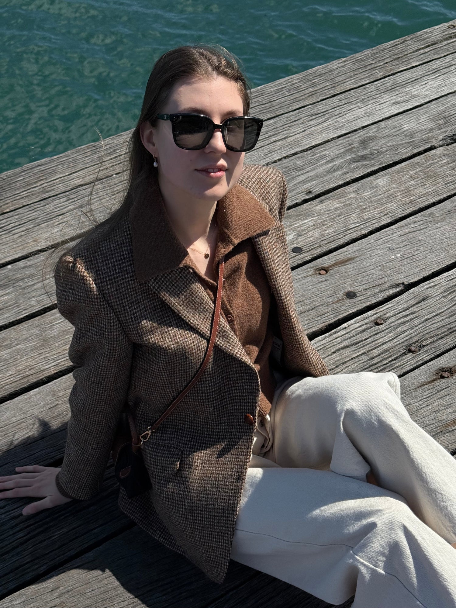 Model wearing everyday pearl hoop earrings