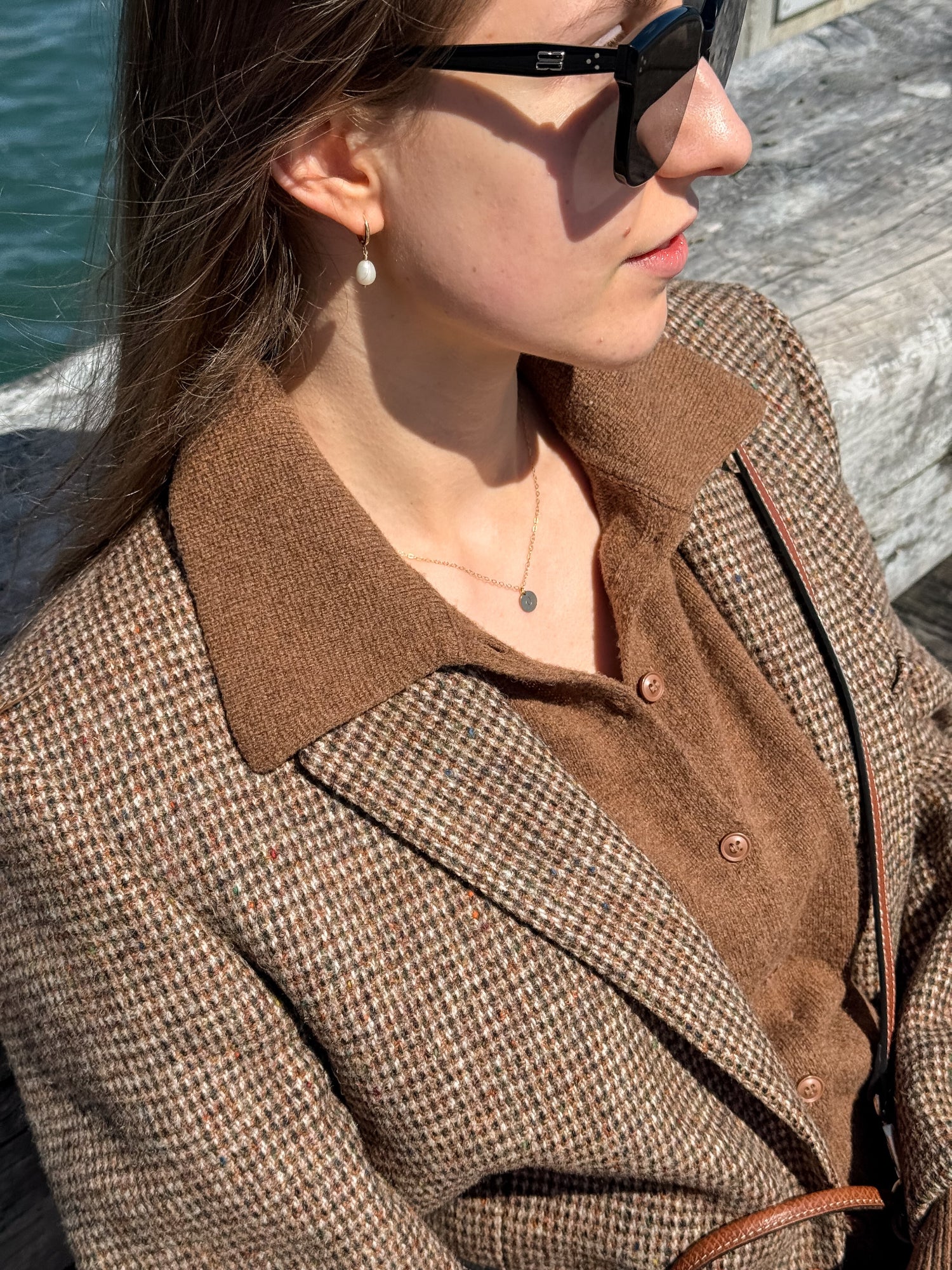 Model wearing everyday pearl hoop earrings