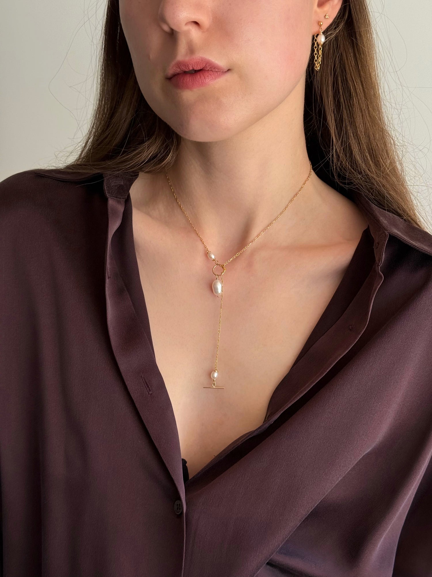 Freshwater pearl necklace styled as a lariat