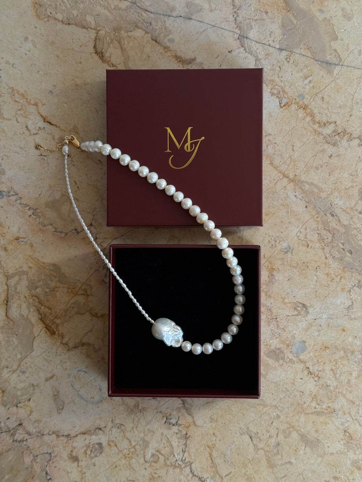 A handcrafted baroque freshwater pearl necklace with deliberate asymmetry. Made to order in Wellington with 14k gold-filled findings. 40cm + extension.