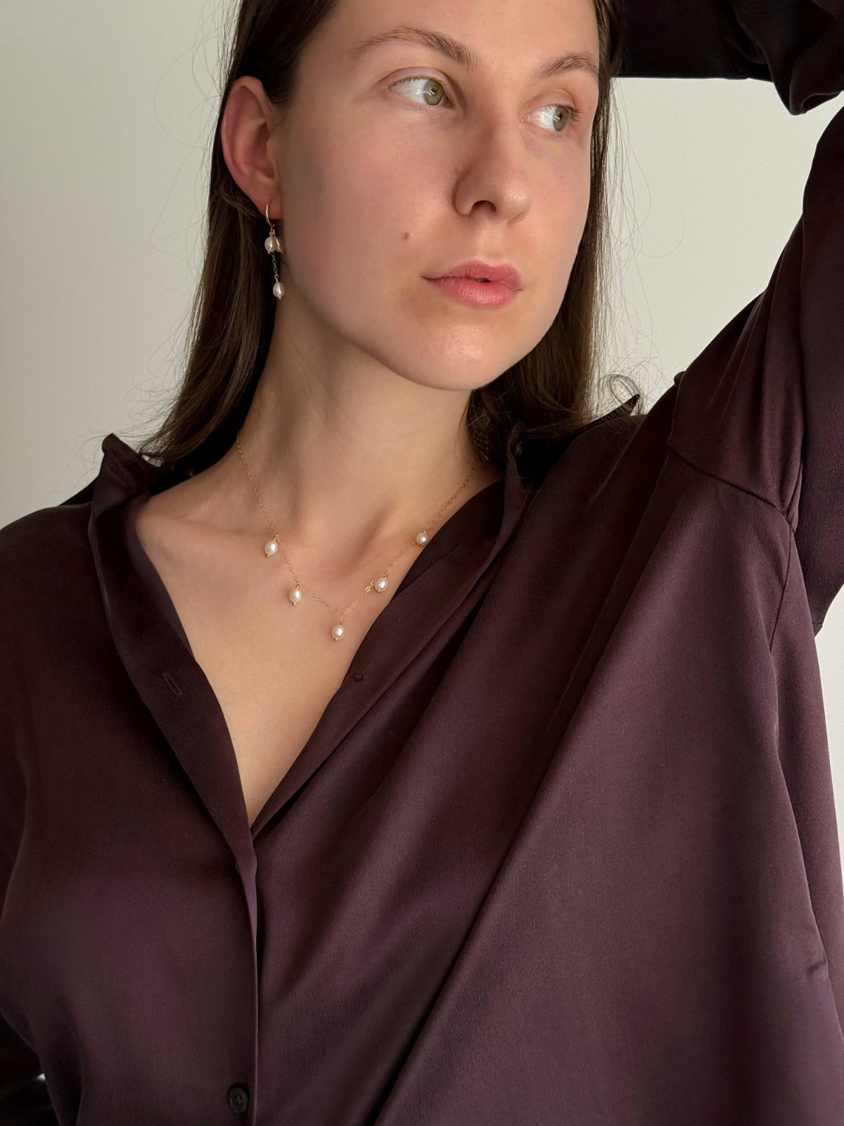 Model wearing five drop freshwater pearl necklace