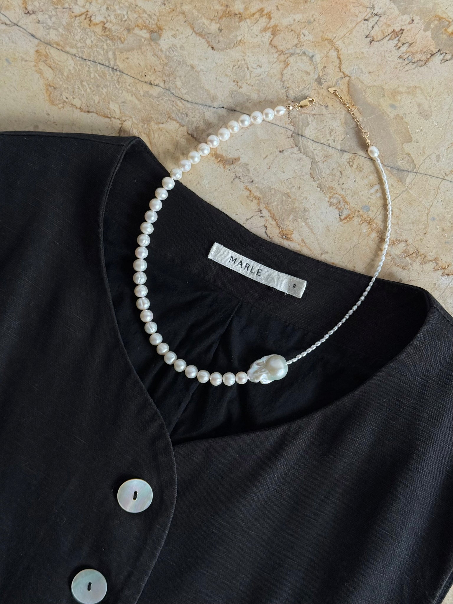 A handcrafted baroque freshwater pearl necklace with deliberate asymmetry. Made to order in Wellington with 14k gold-filled findings. 40cm + extension.