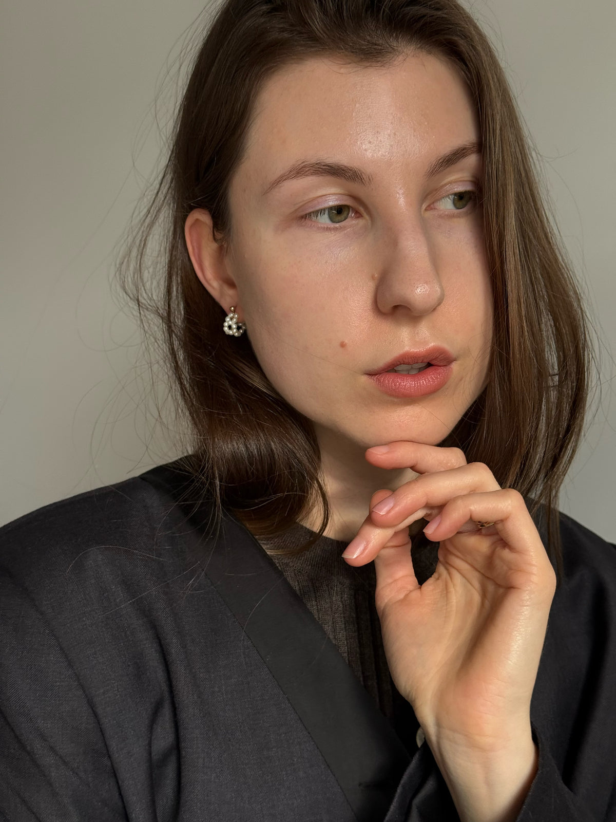 Mini freshwater seed pearl hoop earrings on a 14k gold-filled stud base. 15mm hoop, 2mm pearls. Quietly feminine, worn daily. Made to order in Wellington.