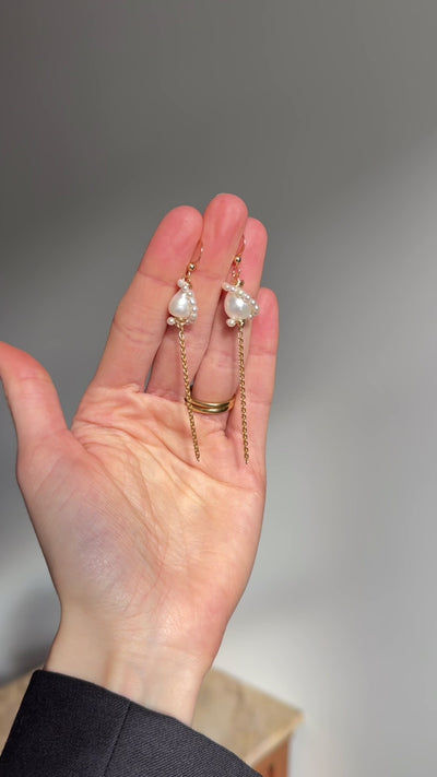 Baroque freshwater pearl and gold chain tassel earrings, 8cm drop. Feminine and striking. 14k gold-filled, made to order in Wellington, New Zealand.